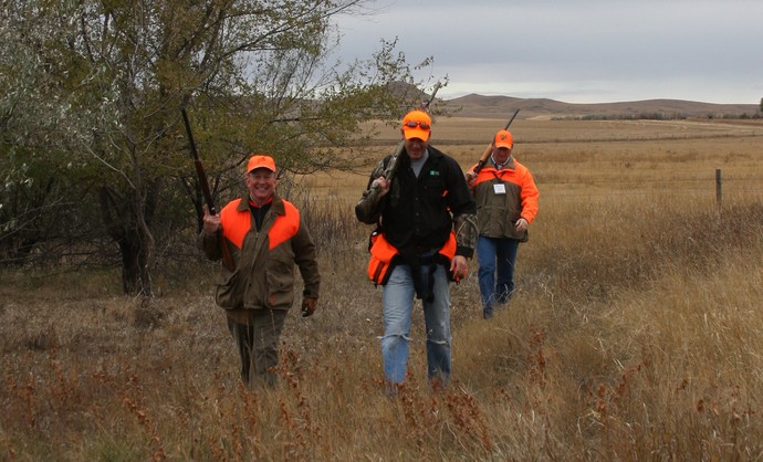 Ron Schmeits & Ryan discussing the first push of the day at Antler Ridge Lodge and the 100's of pheasants that piled out of the food plot.