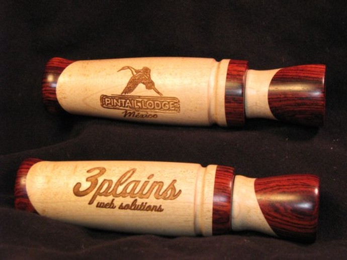 Custom duck calls made by 3plains customer Jake Jacobsen of Jakes Calls. Pictured in the photos: Pintail Lodge a 3plains logos burned into his custom handturned duck calls.