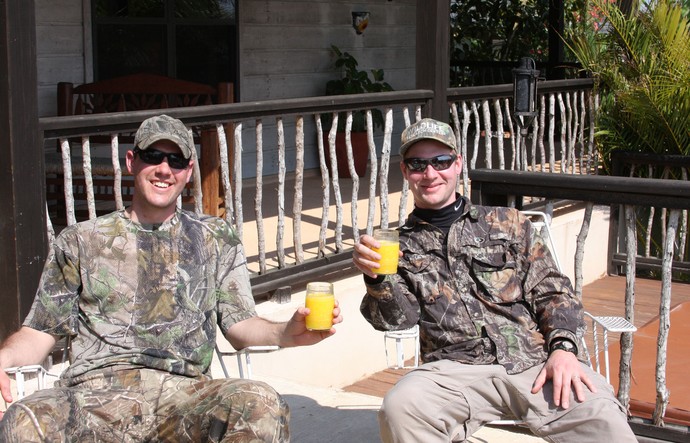 Ryan having a Mango Margarita with Ben and a group of duck hunters from Florida at the Pintail Lodge.