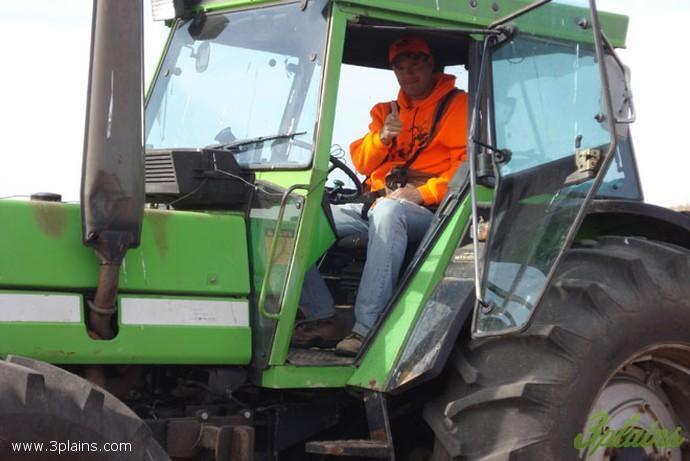 Sizing up the tractor for next season. It's great to get away from the computer sometimes.